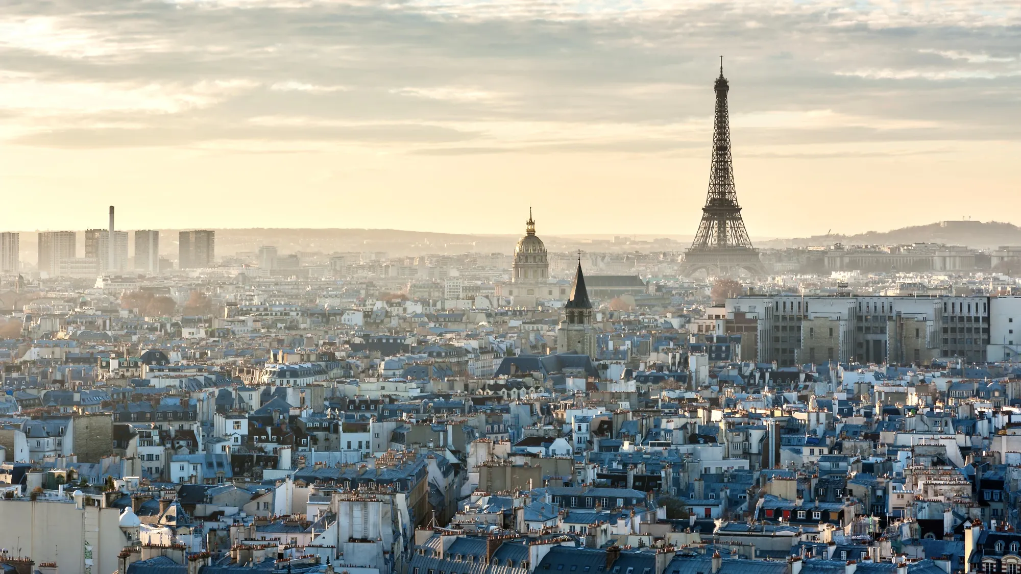 A photo of the Paris skyline, landmarks of note in the photograph include the Eiffel Tower and Hôtel des Invalides