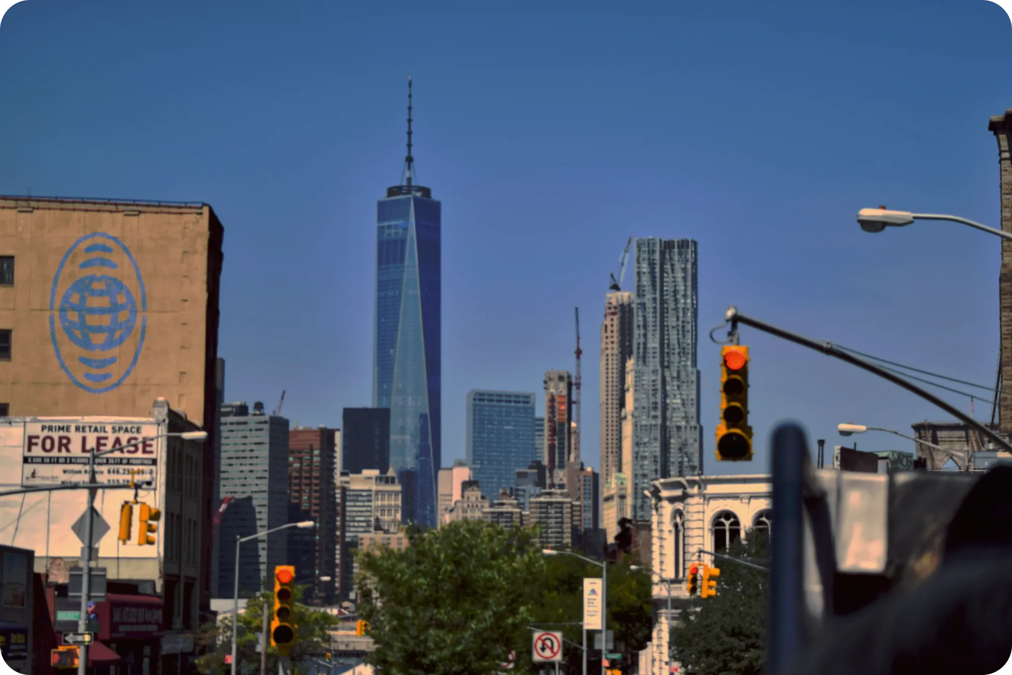 New York City Street with Freedom Tower and Globe UNLTD logo graffiti by Dom Smith for Globe UNLTD - pronounced "Globe Unlimited".