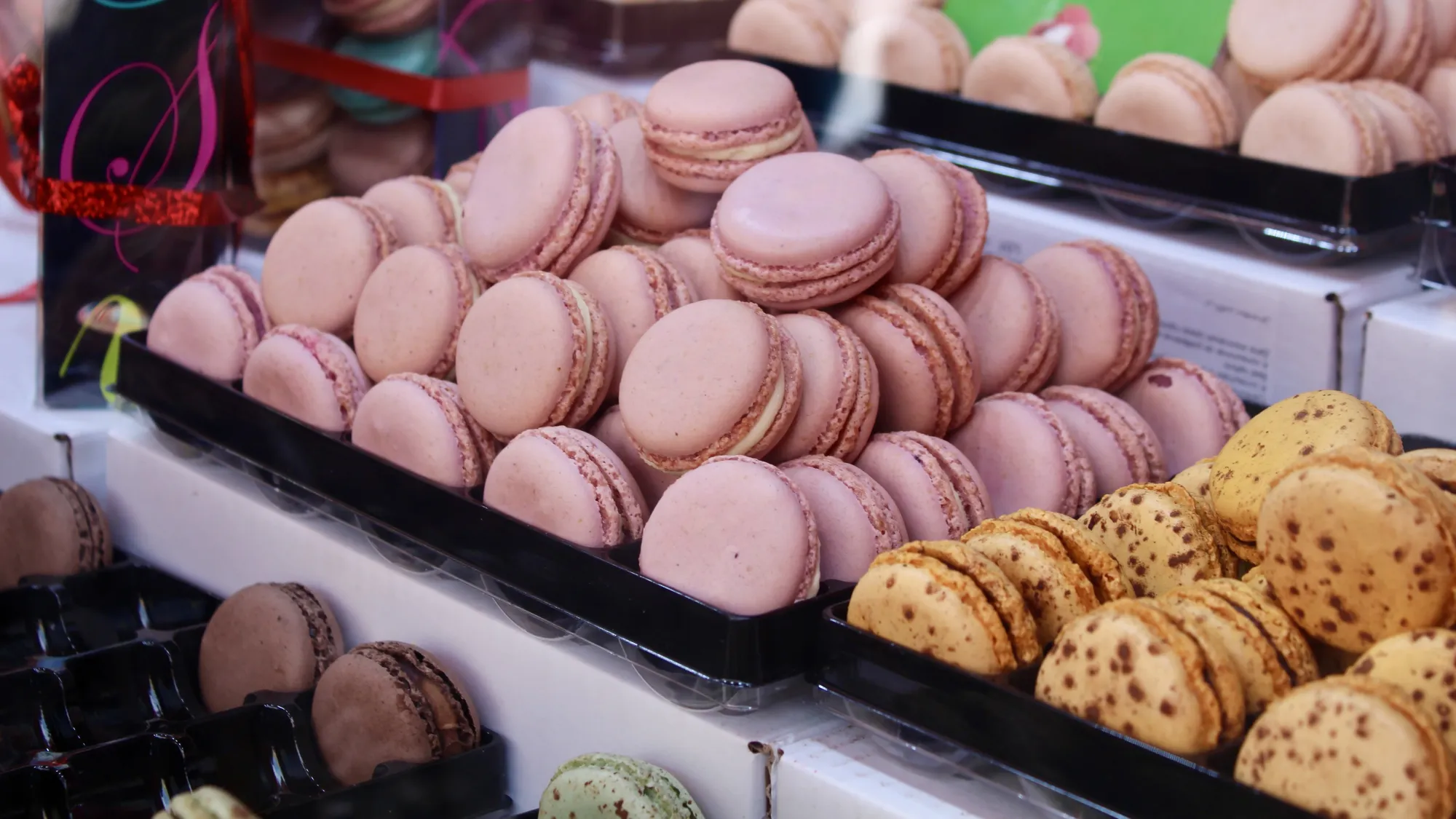 French macarons in a shop-front window in Paris