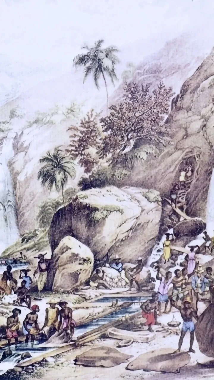 A watercolour painting of African slave labourers working at a gold mine in Minas Gerais, Brazil. There is a waterfall and stream surround by the workers, who seem to be panning for gold.