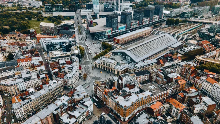 Lille Flanders train station, with Euralille shopping centre and Lille Europe station in the background. Taken from above the Saint Maurice Church.